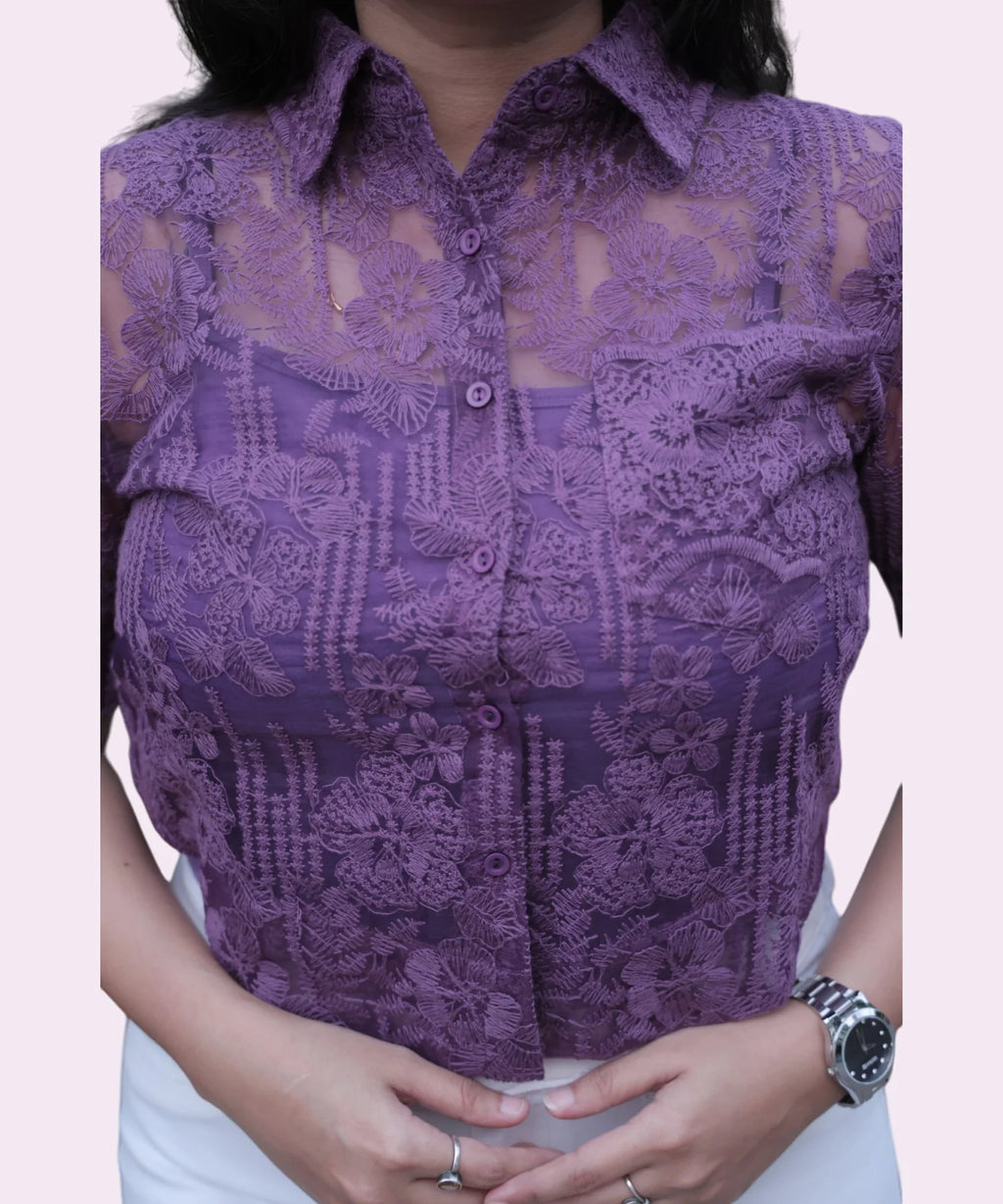 Lightweight sheer fabric detail of grape purple top