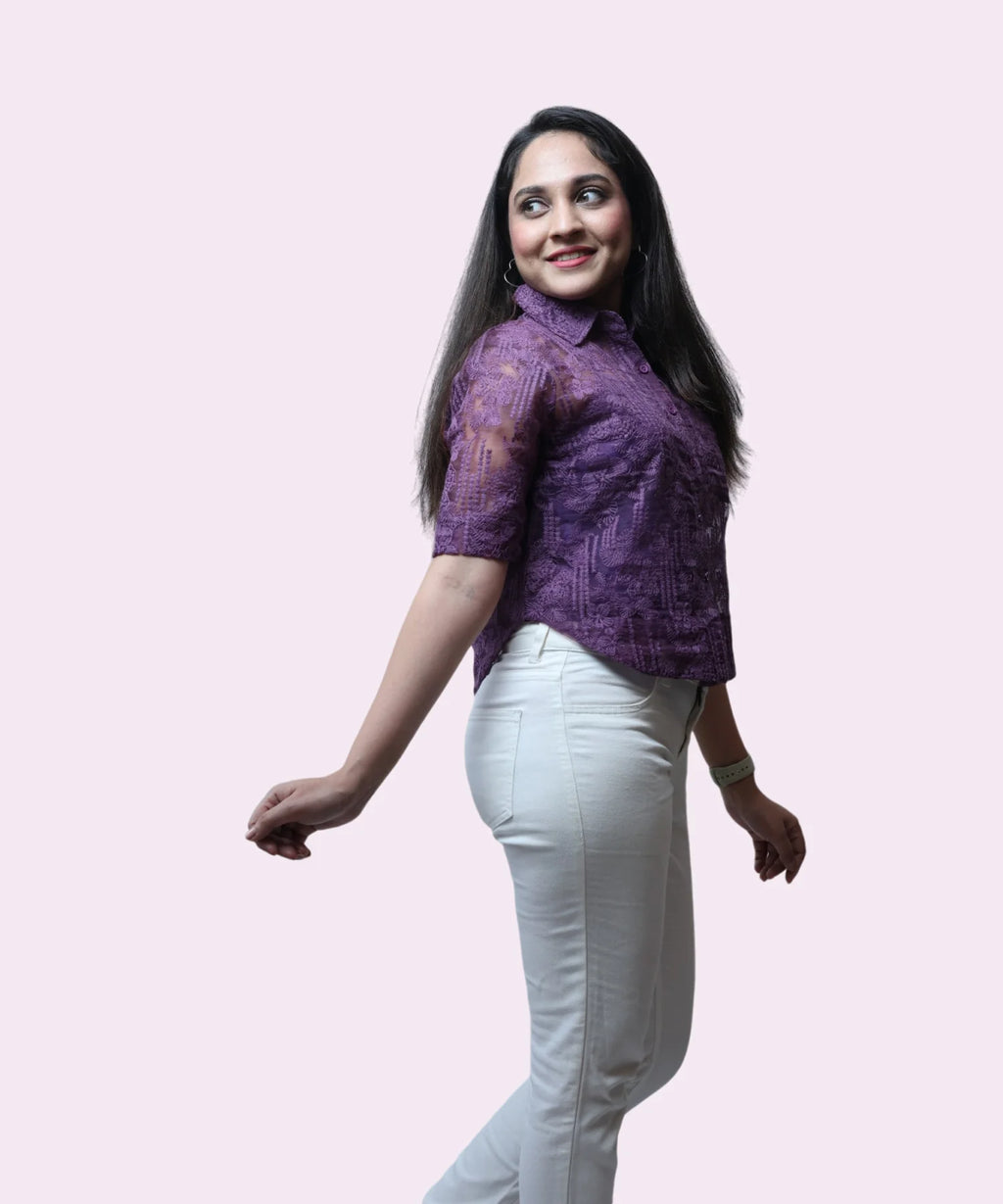 Side profile of grape purple sheer office top