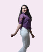 Side profile of grape purple sheer office top