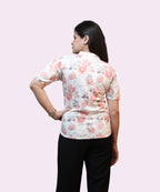 Back view of ivory floral office wear top