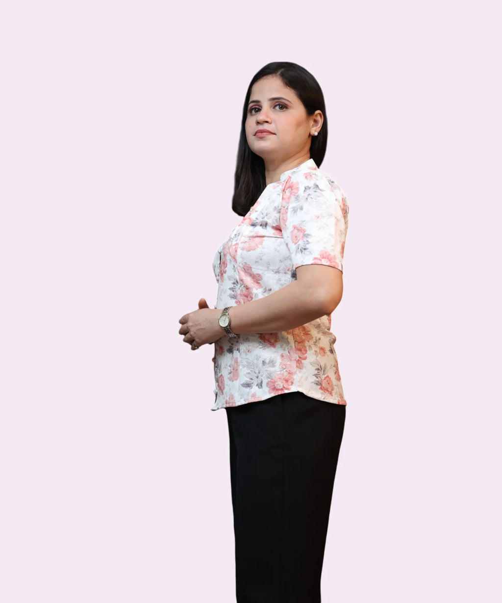 Side profile of floral white workwear top
