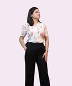 Styled ivory floral top with black trouser office outfit