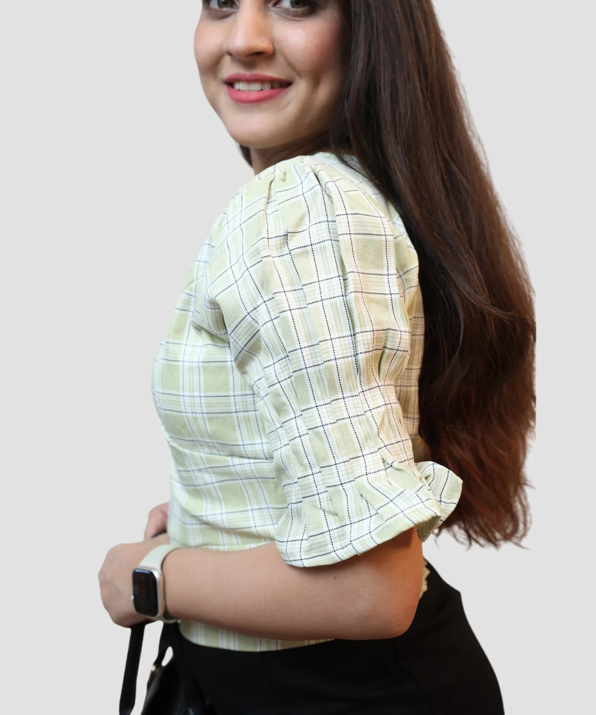 Side view of women’s pista green checks puff sleeve wrap top relaxed fit