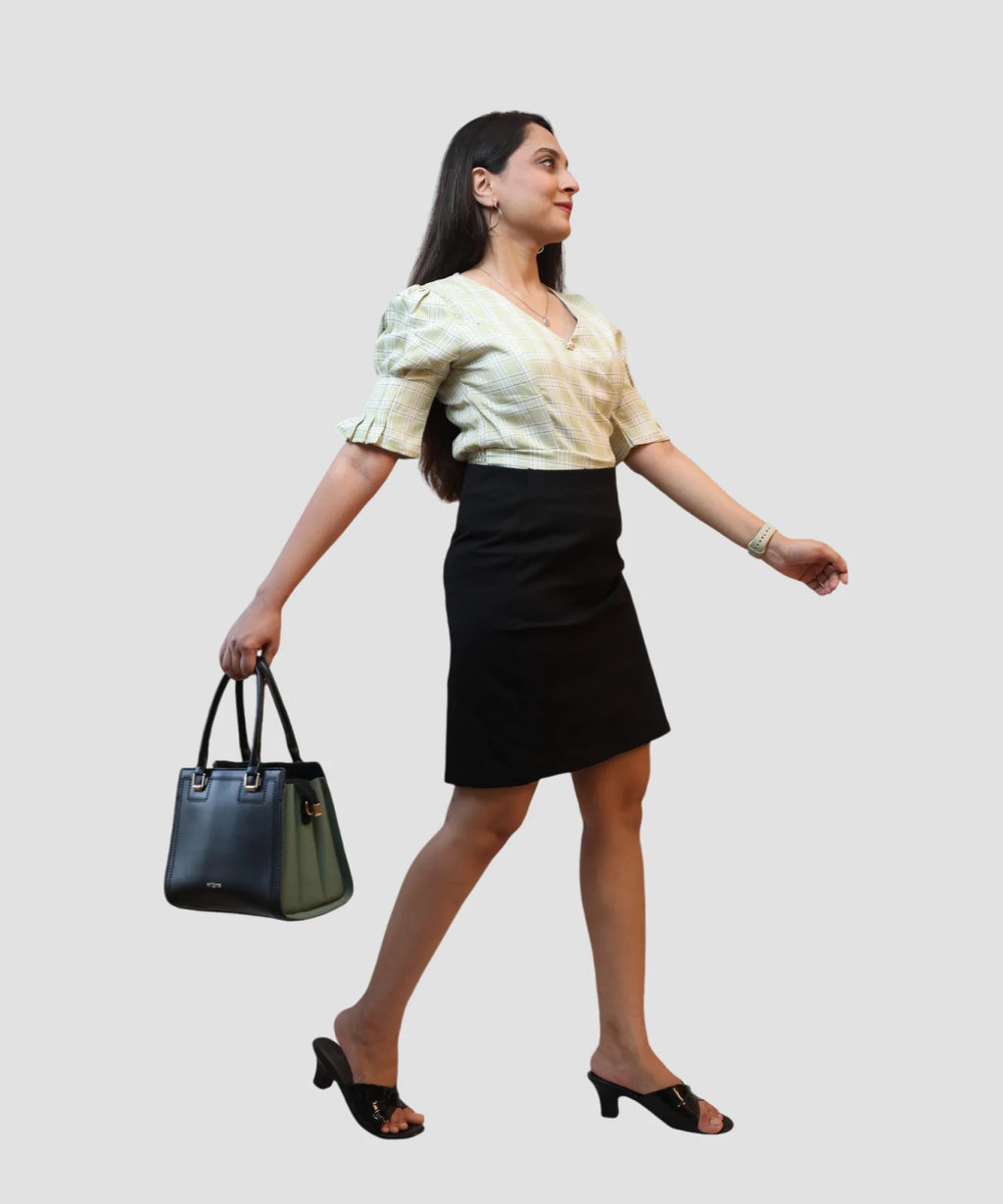 Woman wearing pista green checks wrap crop top puff sleeve modern workwear look