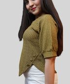 Side button detail on olive workwear top