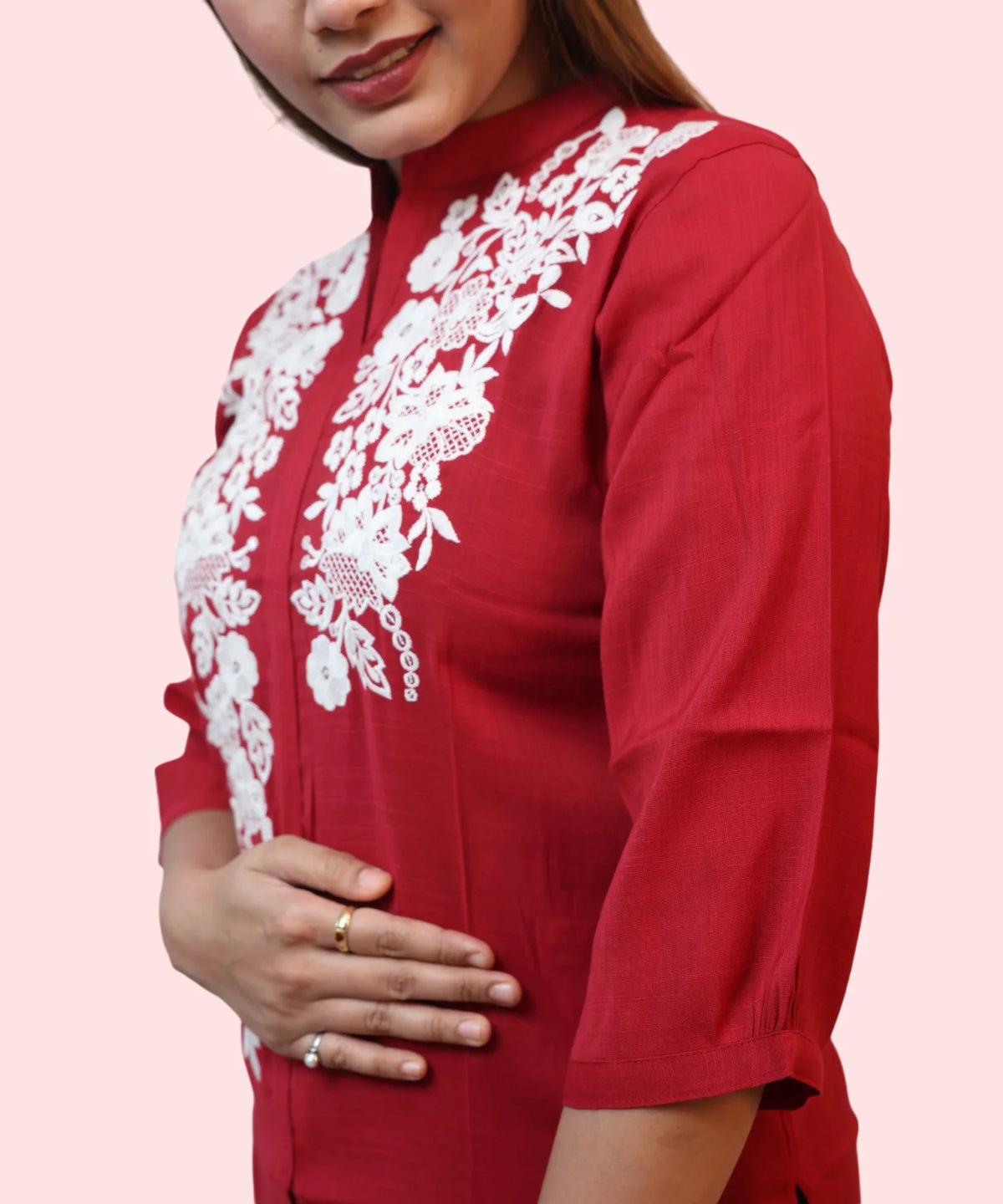 Close-up white floral embroidery and mandarin collar detail on red workwear kurti top Ladymade