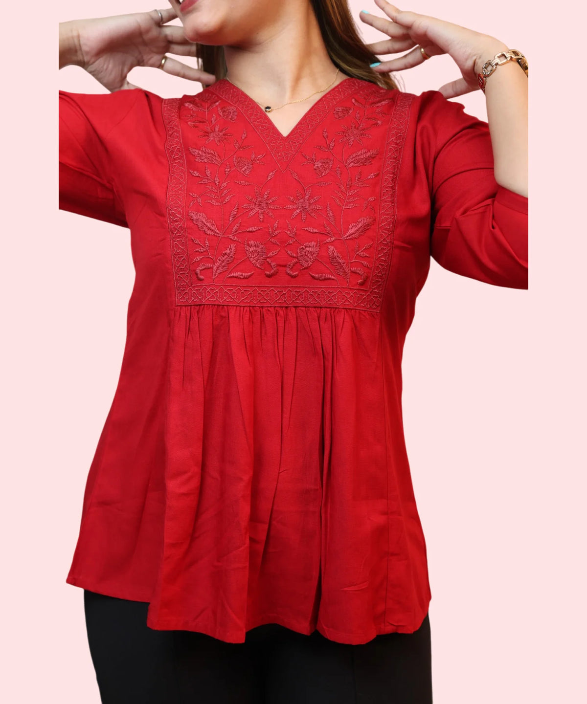 Close-up of tone-on-tone floral embroidery yoke on red workwear kurti Ladymade