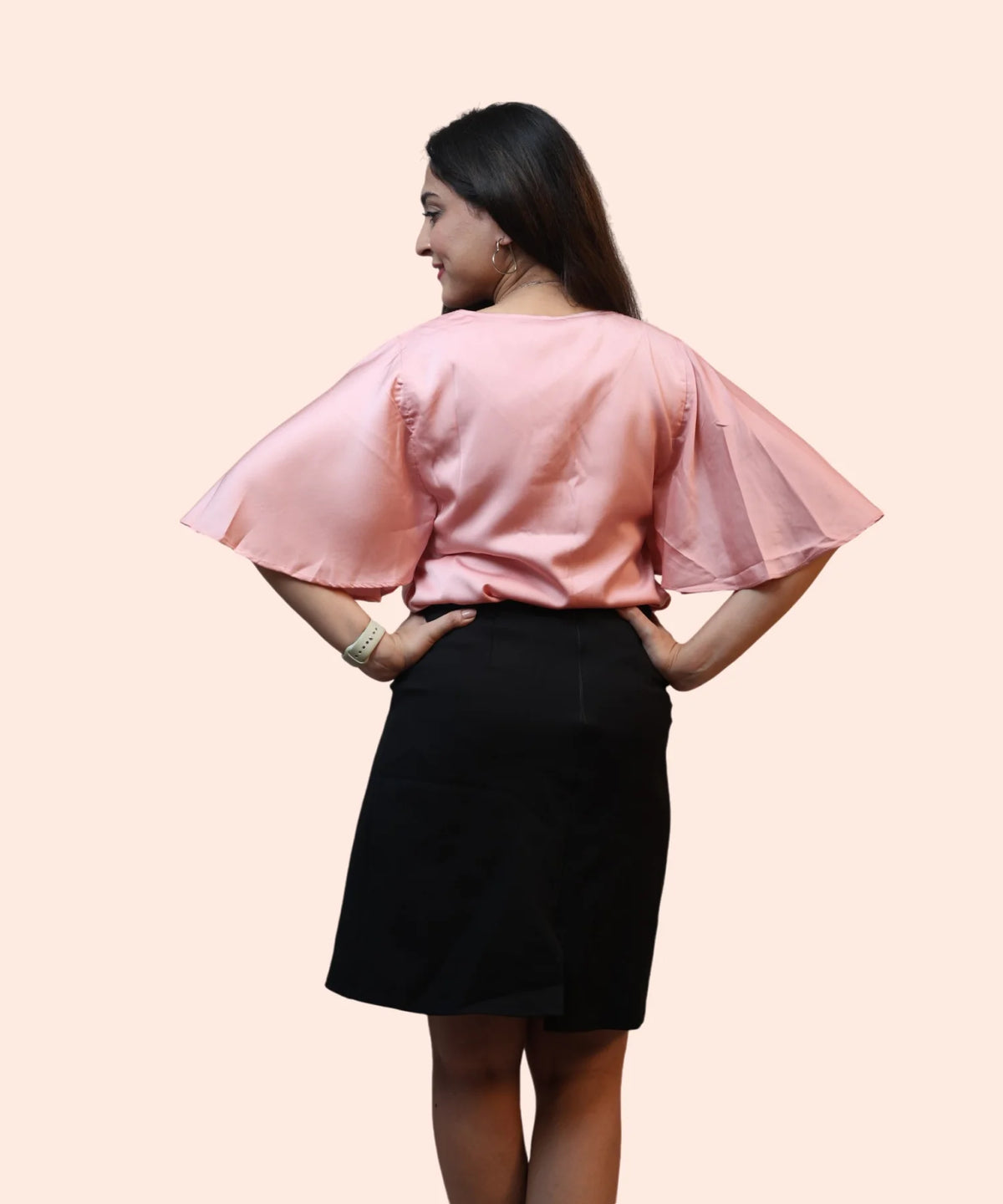 Back view women's baby pink satin cape sleeve workwear blouse full length black pencil skirt Ladymade