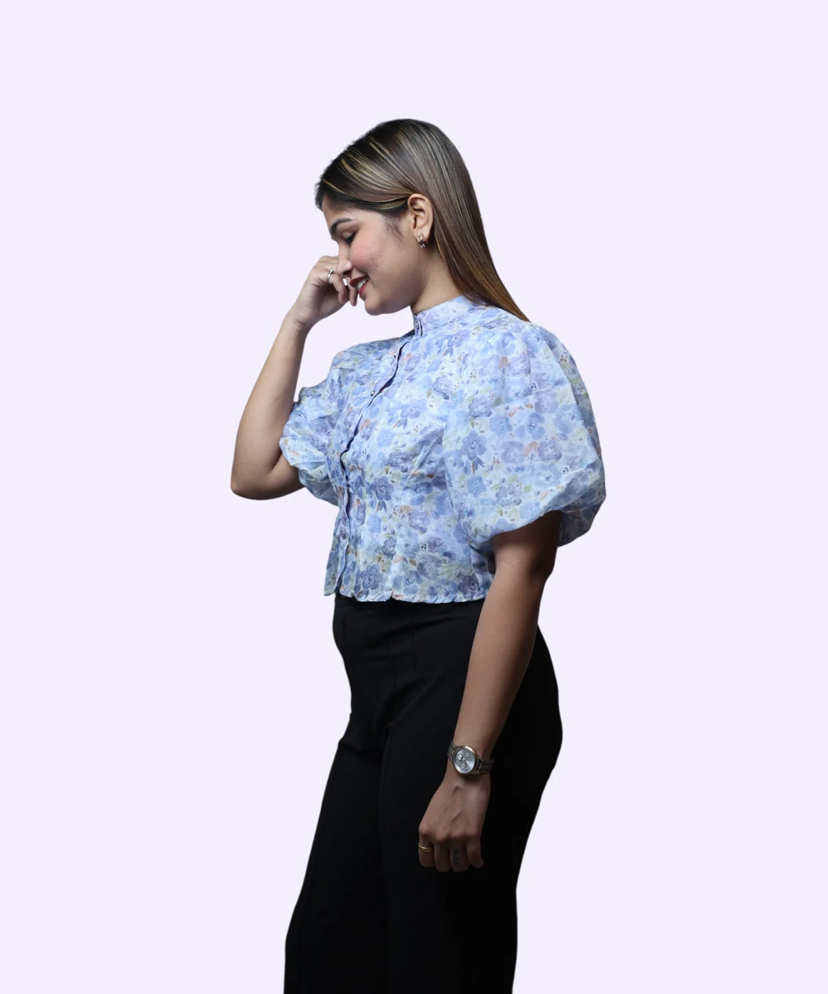 Side profile women's blue floral print high neck peplum top puff sleeve shape workwear black trousers Ladymade