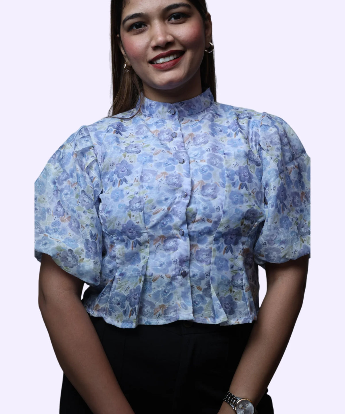 Women's blue floral print high neck puff sleeve peplum workwear top front view smiling Ladymade