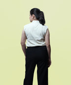 Full back view showcasing the clean shoulder tailoring and regular fit of an ivory formal blouse by Ladymade.