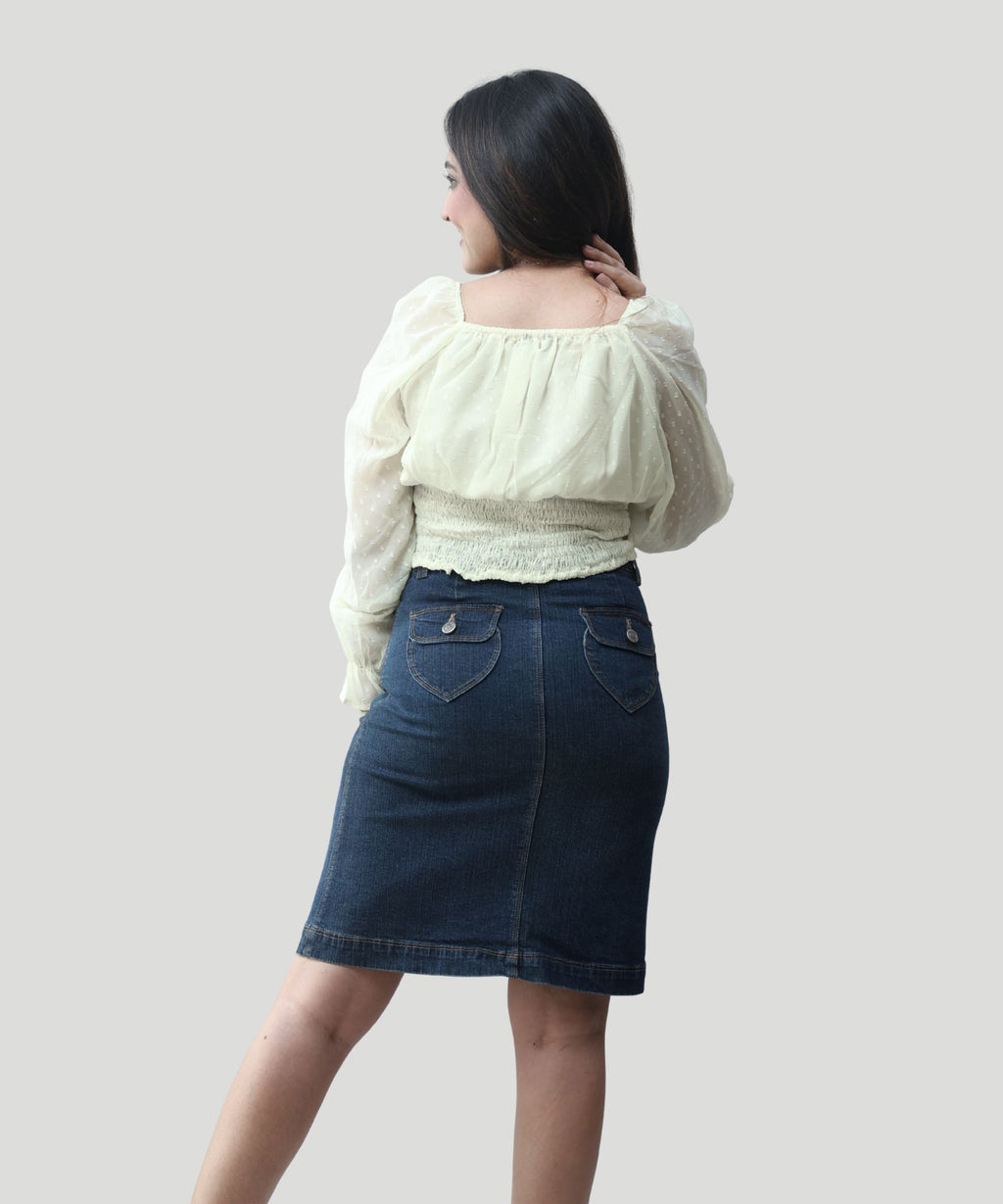 Back view close-up showing the stretch smocked rear panel and square neckline tailoring of a yellow chiffon blouse by Ladymade.
