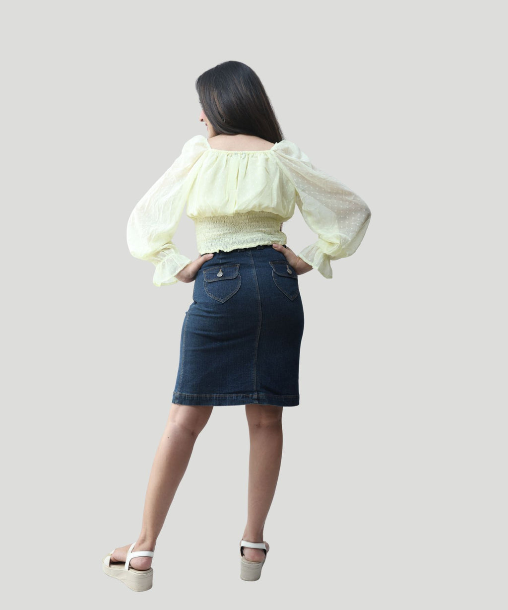 Full back profile showing the regular fit and gathered waistline details of an office and evening wear top by Ladymade.