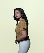 Side profile of women's mehndi green lace puff sleeve workwear top Ladymade