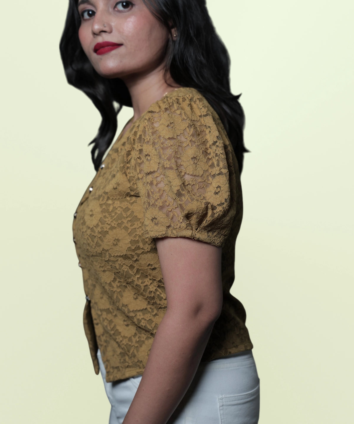 Side close-up of puff sleeve detail on mehndi green lace workwear top Ladymade