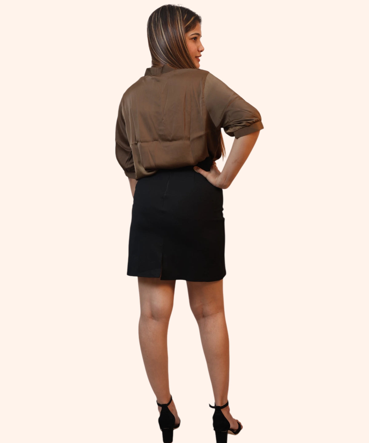 Back view of a women's metallic brown satin blouse featuring puff three-quarter sleeves, a mandarin high collar, and a relaxed drape — elegant office and evening wear at Ladymade.