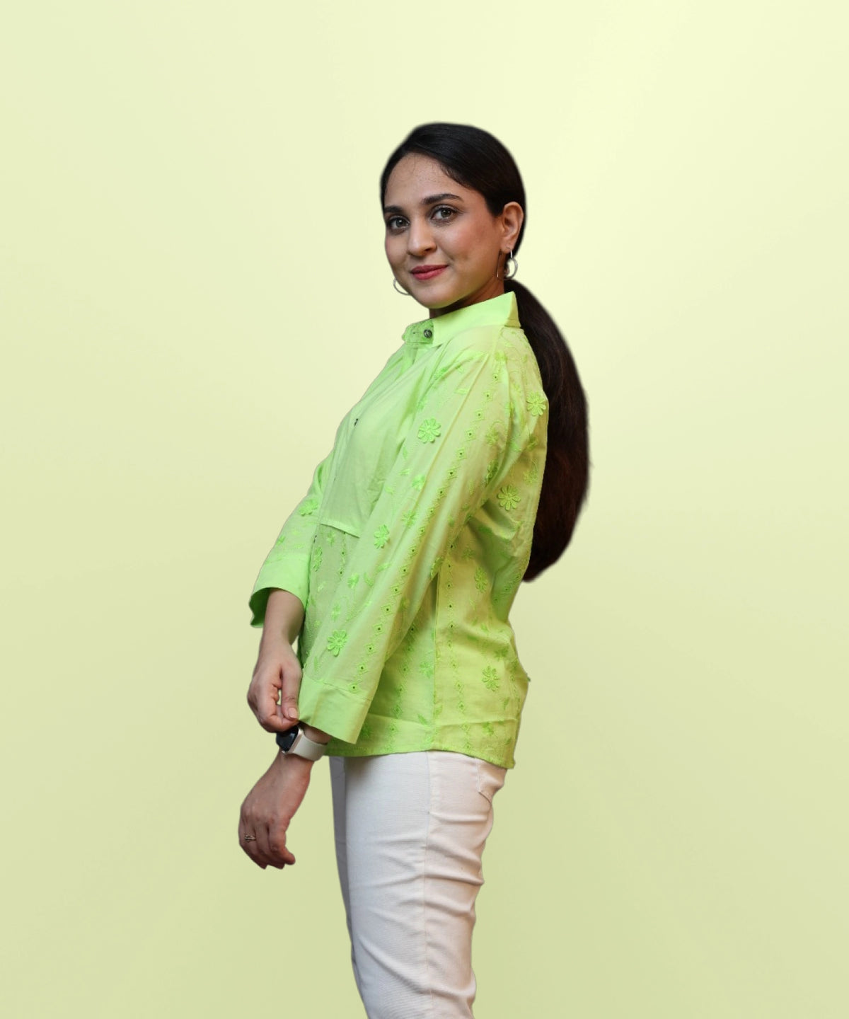 Right side view of women's parrot green schiffli floral embroidered full sleeve shirt Ladymade