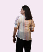 Back view women's pastel viscose stripe puff sleeve top full length black trousers Ladymade