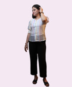Women's pastel viscose stripe puff sleeve top side profile full length black trousers Ladymade