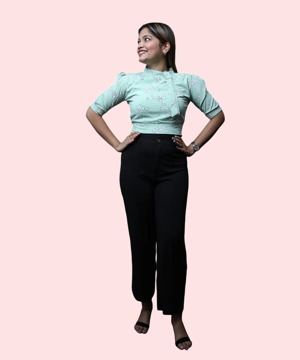 Full length women's pista green floral mock neck puff sleeve workwear top black trousers Ladymade