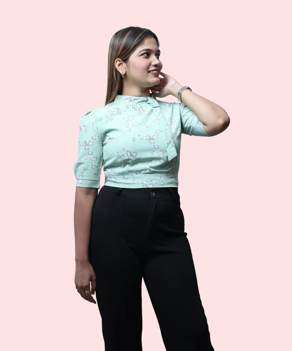 Three-quarter angle women's pista green floral print mock neck puff sleeve workwear blouse Ladymade