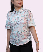 Front view women's sky blue floral print collared shirt drawstring shoulder tie tassel detail Ladymade