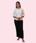 Full length front view women's white mauve abstract print formal shirt black wide-leg trousers Ladymade