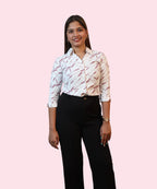 Full length women's white mauve abstract print formal shirt tucked into black wide-leg trousers workwear Ladymade